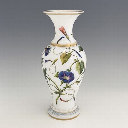 665 - A 19th century French white opaline glass vase, baluster form, painted with convolvulus and banded i... 