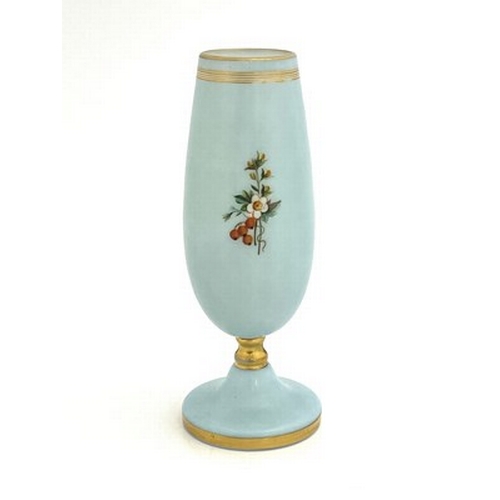 668 - An enamelled opaline glass vase, probably Baccarat circa 1870, ovoid pedestal form, the pale blue bo... 