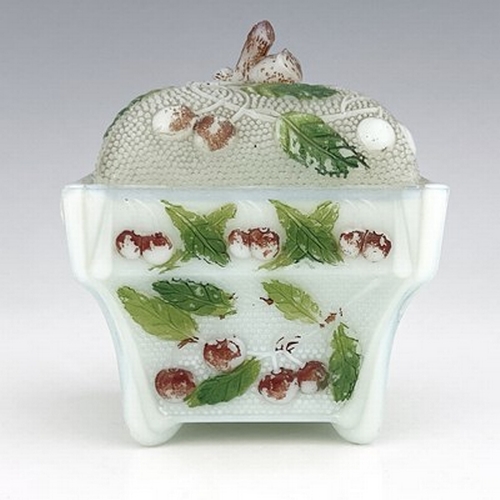 669 - An opaline glass sugar bowl and cover, relief moulded with cherries polychrome enamelld, square form... 