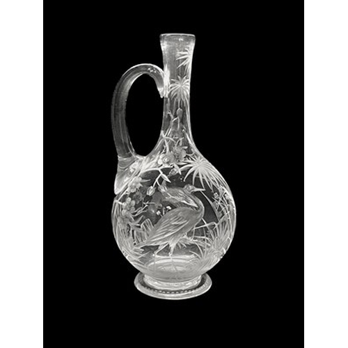 679 - Joseph Keller for Stevens and Williams, a Stourbridge engraved glass claret jug or ewer, probably Jo... 