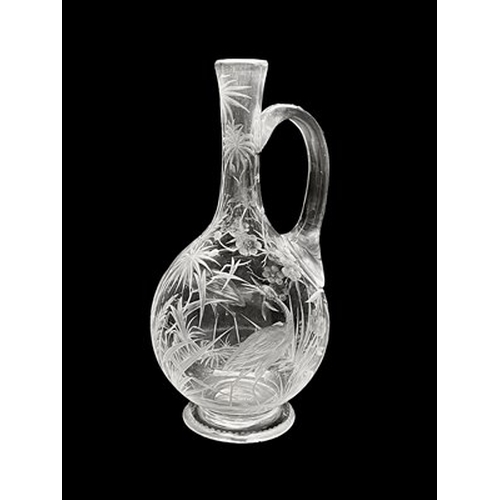 679 - Joseph Keller for Stevens and Williams, a Stourbridge engraved glass claret jug or ewer, probably Jo... 