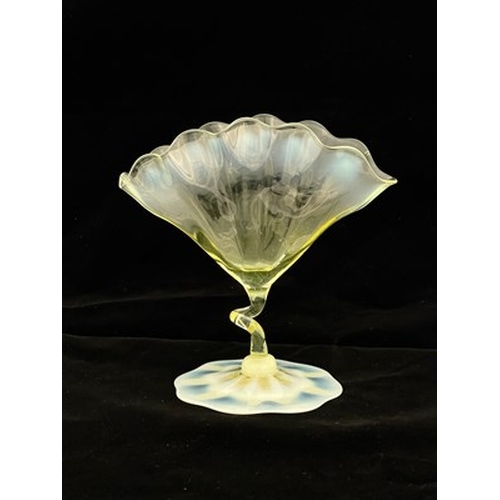 687 - John Walsh Walsh, an Arts and Crafts straw opal glass vase, circa 1900, the optic ribbed fan shaped ... 