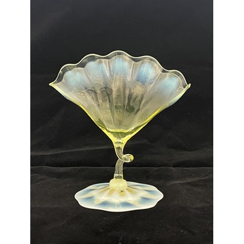 687 - John Walsh Walsh, an Arts and Crafts straw opal glass vase, circa 1900, the optic ribbed fan shaped ... 