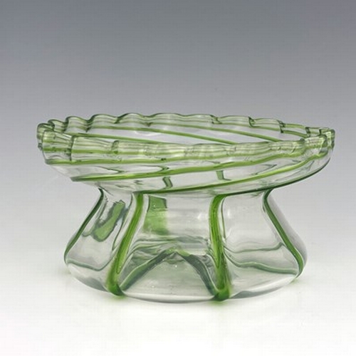 688 - A Stuart Arts and Crafts green trailed glass bowl, circa 1890, squat hyacinth vase for, conical with... 