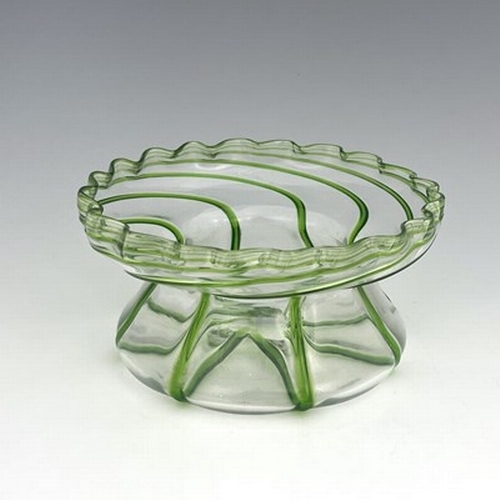 688 - A Stuart Arts and Crafts green trailed glass bowl, circa 1890, squat hyacinth vase for, conical with... 