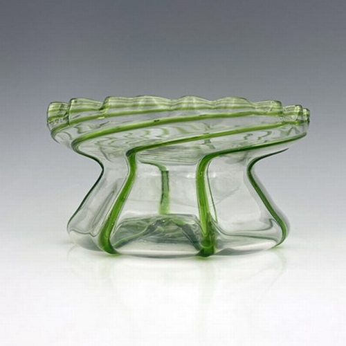 688 - A Stuart Arts and Crafts green trailed glass bowl, circa 1890, squat hyacinth vase for, conical with... 