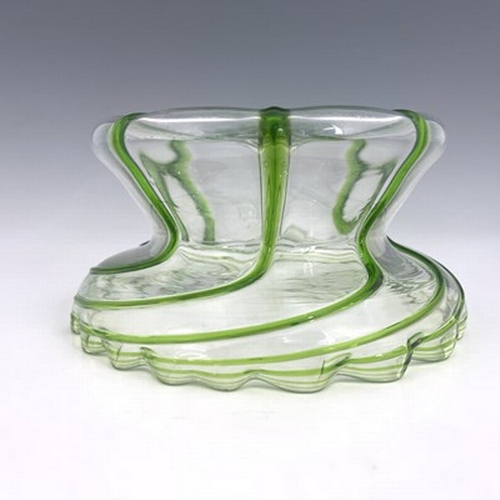 688 - A Stuart Arts and Crafts green trailed glass bowl, circa 1890, squat hyacinth vase for, conical with... 