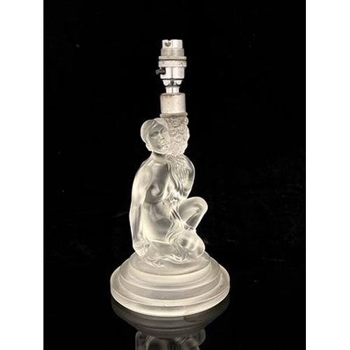 712 - Walther and Sohne, an Art Deco glass figural lamp base, modelled as a nude woman holding a bouquet o... 