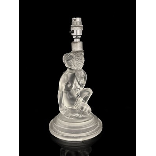 712 - Walther and Sohne, an Art Deco glass figural lamp base, modelled as a nude woman holding a bouquet o... 