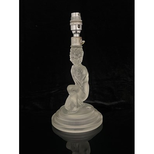 712 - Walther and Sohne, an Art Deco glass figural lamp base, modelled as a nude woman holding a bouquet o... 