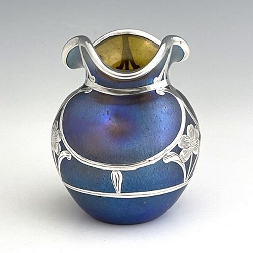 718 - Loetz, a Secessionist silver overlay Silberiris iridescent glass vase, dimpled ovoid form with band ... 