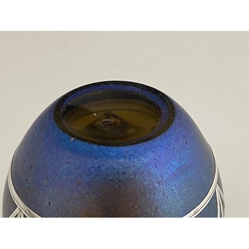 718 - Loetz, a Secessionist silver overlay Silberiris iridescent glass vase, dimpled ovoid form with band ... 