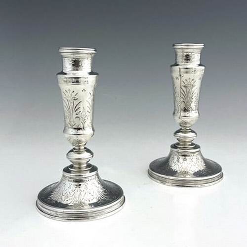 73 - A pair of French Aesthetic Movement silver plated candlesticks, Christofle, Paris circa 1880, turned... 