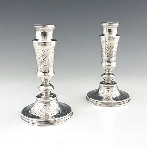 73 - A pair of French Aesthetic Movement silver plated candlesticks, Christofle, Paris circa 1880, turned... 