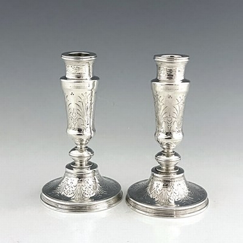 73 - A pair of French Aesthetic Movement silver plated candlesticks, Christofle, Paris circa 1880, turned... 