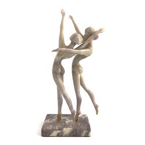 754 - Istvan Komaromy, a glass lampwork figure group, circa 1950, modelled as two nude women dancing, pink... 