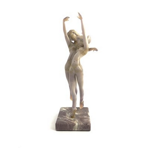 754 - Istvan Komaromy, a glass lampwork figure group, circa 1950, modelled as two nude women dancing, pink... 