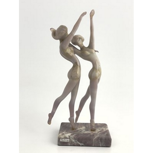 754 - Istvan Komaromy, a glass lampwork figure group, circa 1950, modelled as two nude women dancing, pink... 