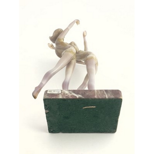 754 - Istvan Komaromy, a glass lampwork figure group, circa 1950, modelled as two nude women dancing, pink... 