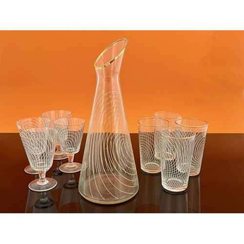 759 - Chance Glass, a Modernist Swirl pattern wine service, circa 1955, including Giraffe carafe, eight wi... 