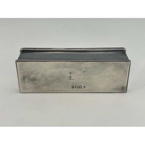 76 - Kate Harris for William Hutton, an Arts and Crafts silver box, London 1904, cuboid form with hinged ... 