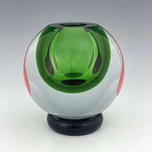 770 - A Modernist Murano glass Sommerso type vase, spherical form, colourless over green, with internal op... 