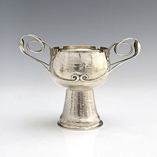 78 - Kate Harris for William Hutton, an Arts and Crafts silver twin handled beaker vase, London 1905, pla... 