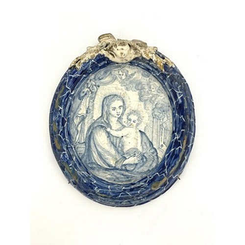 789 - A French faience blue and white plaque, 19th century or earlier, painted with an image of the Virgin... 