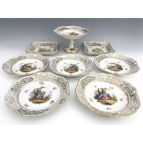 803 - An eight piece Dresden porcelain dessert service, reticulated basket weave borders, painted with cou... 