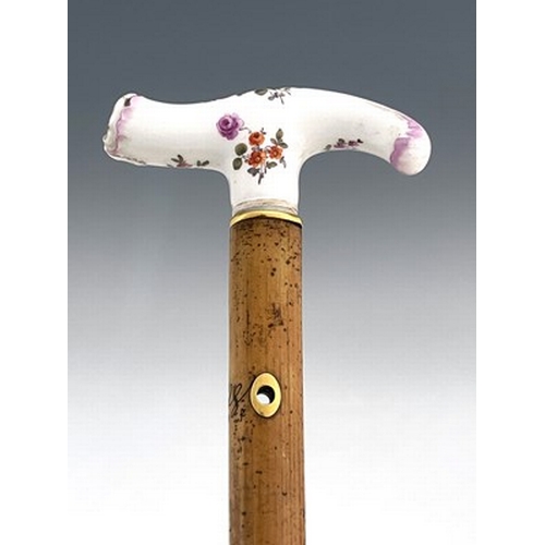 808 - A Meissen porcelain handled and Swedish 18 carat gold mounted malacca cane, the collar dated 1891, t... 