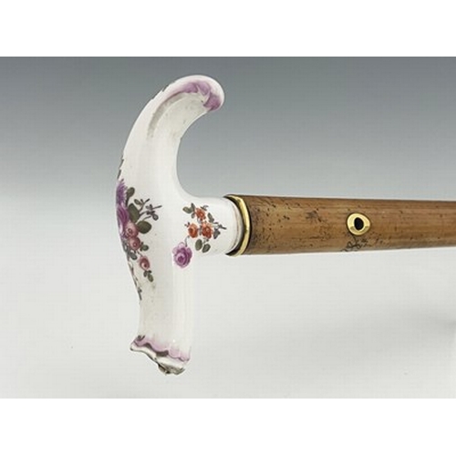 808 - A Meissen porcelain handled and Swedish 18 carat gold mounted malacca cane, the collar dated 1891, t... 