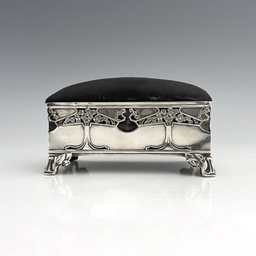 81 - Kate Harris for William Hutton, an Arts and Crafts silver jewellery casket, London 1902, cuboid form... 