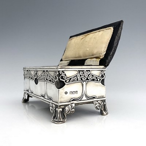 81 - Kate Harris for William Hutton, an Arts and Crafts silver jewellery casket, London 1902, cuboid form... 