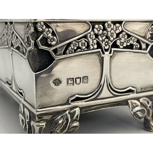 81 - Kate Harris for William Hutton, an Arts and Crafts silver jewellery casket, London 1902, cuboid form... 