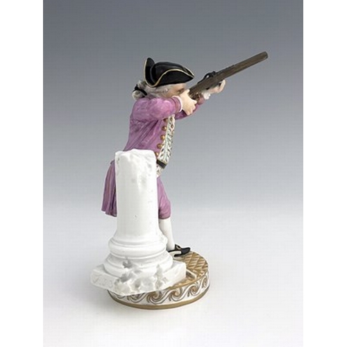 810 - A Meissen figure of a hunter firing a shotgun, model F33, Marcolini mark and period circa 1810, on r... 