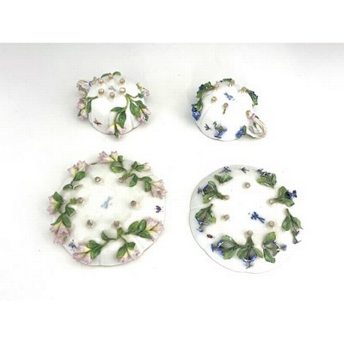 811 - Two Meissen florally encrusted tea cups and saucers, one with forget me nots, the other with campanu... 