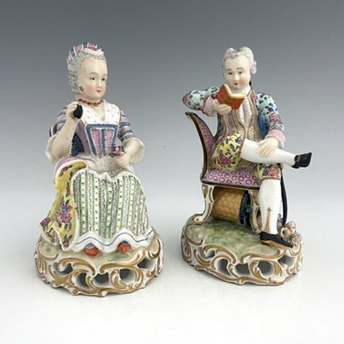 817 - A pair of Meissen type figures, probably late 18th century, model 137, modelled as a seated woman wi... 