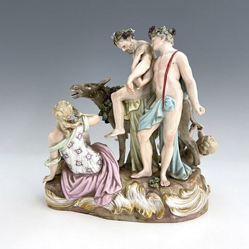 818 - A Meissen group of Bacchic figures, circa 1880, painted in polychrome enamels and modelled as Bacchu... 