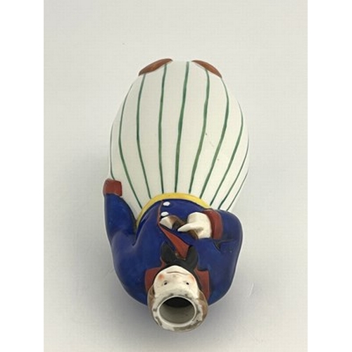 828 - J Bastard for Robj, an Art Deco novelty figural bottle flask, circa 1925, modelled as a Dutch man ho... 