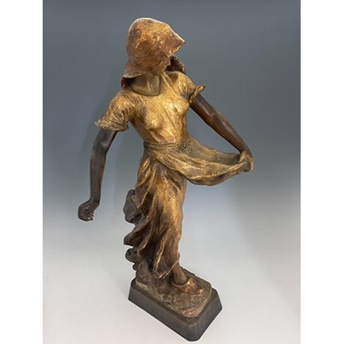 829 - Goldscheider, figure of a Dutch woman, highlighted in gilt, impressed marks and numbered 1935 1744 2... 