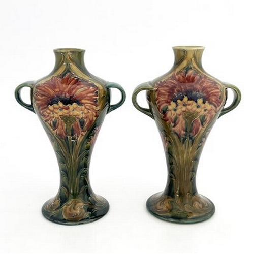 833 - William Moorcroft for Townsend and Co, Newcastle, a pair of twin handled Revived Cornflower vases, 1... 