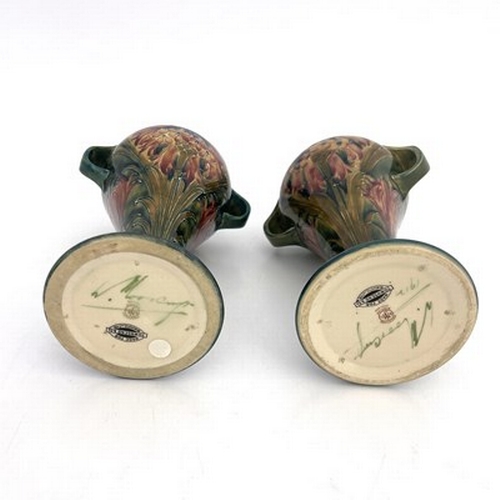 833 - William Moorcroft for Townsend and Co, Newcastle, a pair of twin handled Revived Cornflower vases, 1... 