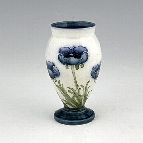 835 - William Moorcroft for James MacIntyre, a miniature Blue Poppy vase, circa 1903, footed and shouldere... 