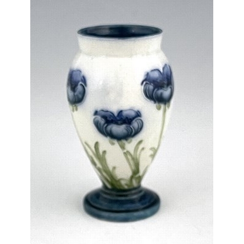 835 - William Moorcroft for James MacIntyre, a miniature Blue Poppy vase, circa 1903, footed and shouldere... 