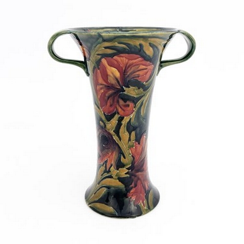 838 - William Moorcroft, a Spanish twin handled vase, circa 1915, waisted form, impressed Burslem marks an... 