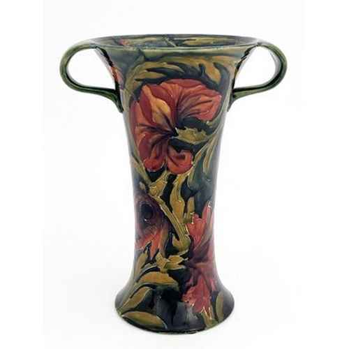 838 - William Moorcroft, a Spanish twin handled vase, circa 1915, waisted form, impressed Burslem marks an... 