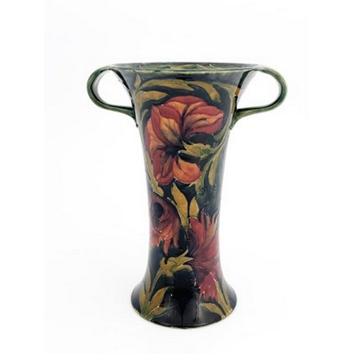 838 - William Moorcroft, a Spanish twin handled vase, circa 1915, waisted form, impressed Burslem marks an... 