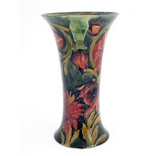 838 - William Moorcroft, a Spanish twin handled vase, circa 1915, waisted form, impressed Burslem marks an... 