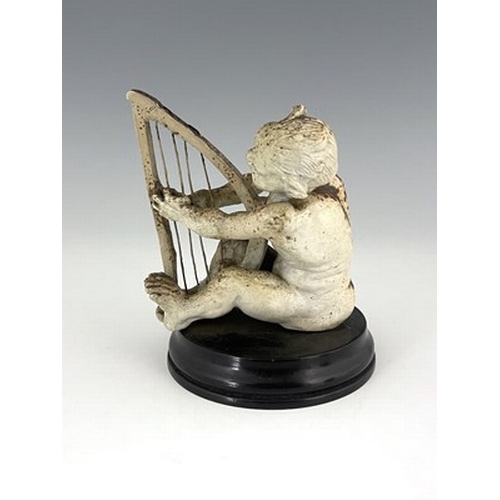 850 - Robert Wallace Martin for Martin Brothers, a stoneware musical imp figure, circa 1893, modelled play... 