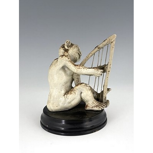 850 - Robert Wallace Martin for Martin Brothers, a stoneware musical imp figure, circa 1893, modelled play... 